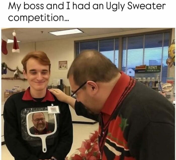 Two men in an office wearing ugly sweaters, one with a mirror showing the other's face, humor in reality memes.