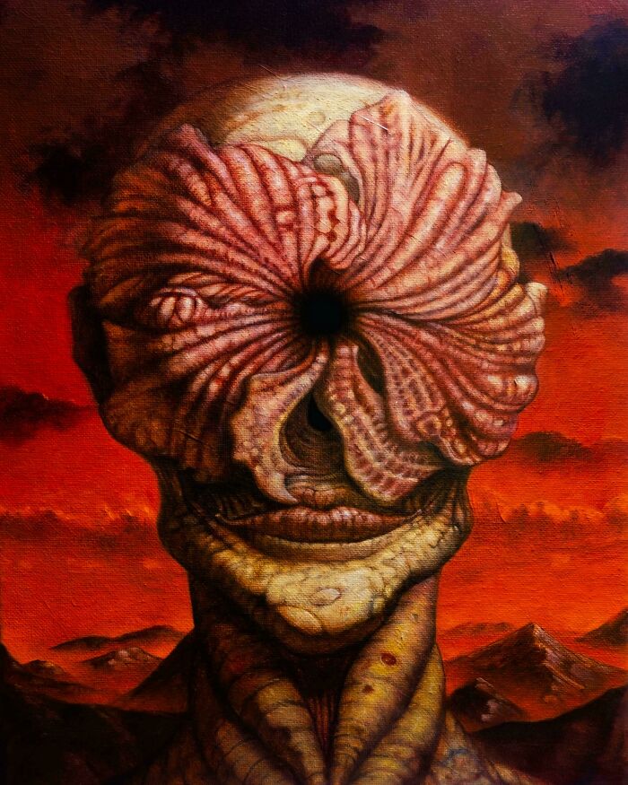 Surreal creature with a flower-like face and textured skin standing against a dark red ominous sky, scary posts online.
