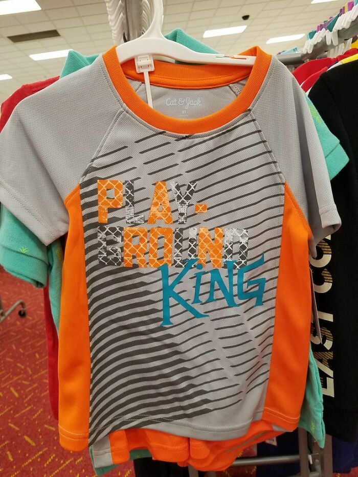 Children’s shirt with a confusing print showing a hilarious fashion fail in text design and color choices.