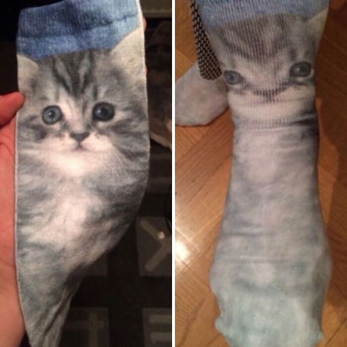 Sock with a kitten face printed on it, showing a funny mismatch when worn, highlighting hilarious fashion fails.