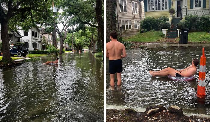 Two people relaxing and swimming in a flooded street, an example of weirdest things found in the streets.