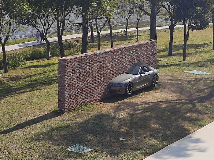 Car In A Wall