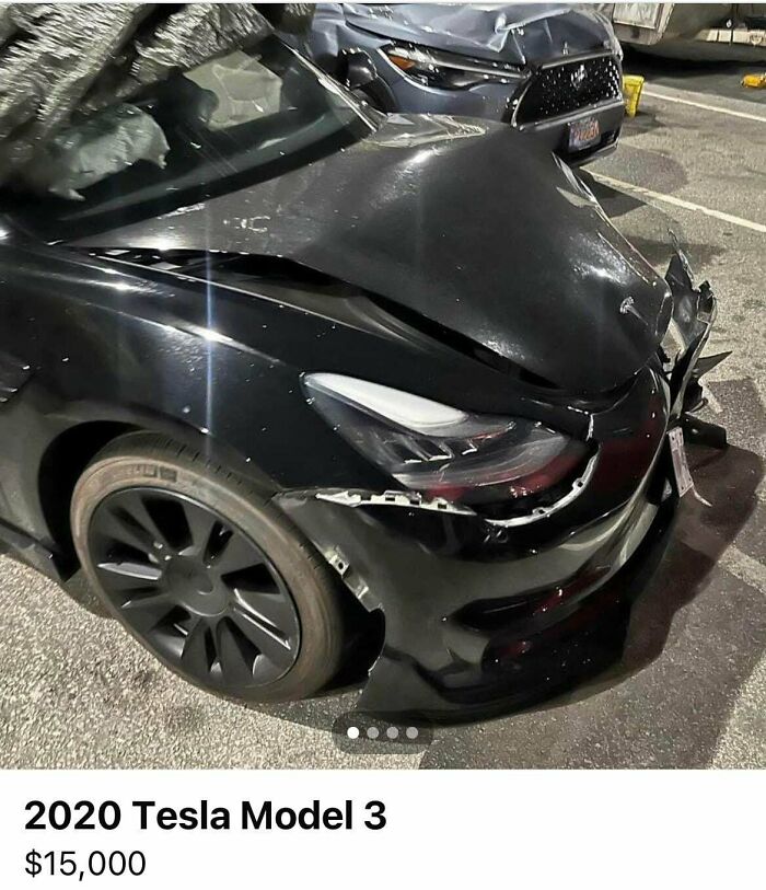 Damaged 2020 Tesla Model 3 with crushed hood and airbags deployed, listed to sell online for $15,000