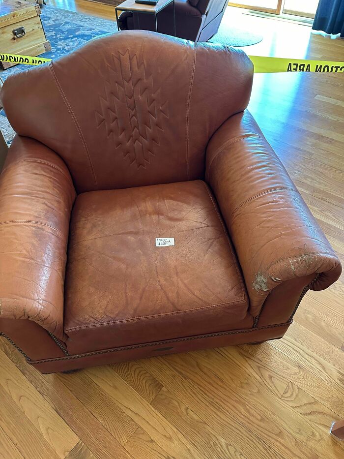 Worn leather armchair with price note, example of unhinged things people could sell online