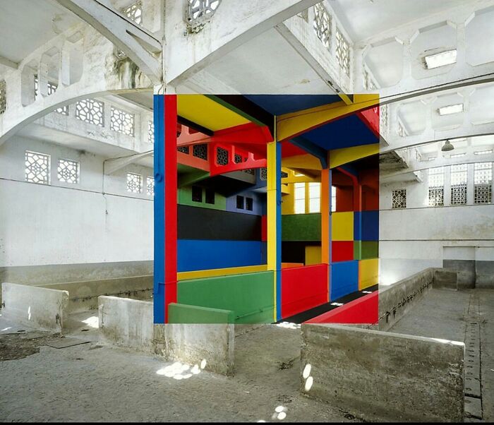 Colorful geometric installation inside an empty white hall, surreal scene suggesting glitches in the matrix