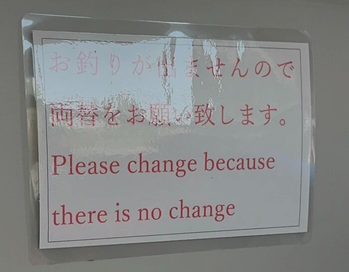 Sign in Japan with a funny English translation error showing a request to change money due to no change available.