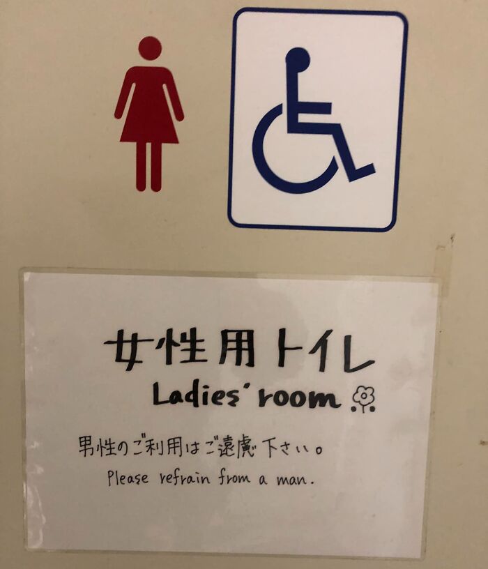 Sign on a ladies room door in Japan with humorous English translation showing translation errors and cultural confusion.