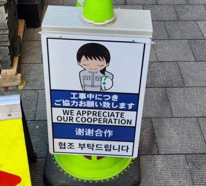 Japanese street sign with humorous English translation thanking for cooperation, showing Japan lost in English translation cases.
