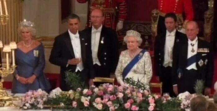 Barack Obama with British royalty at a formal event, captured during a pop culture moment that made people cringe hard.