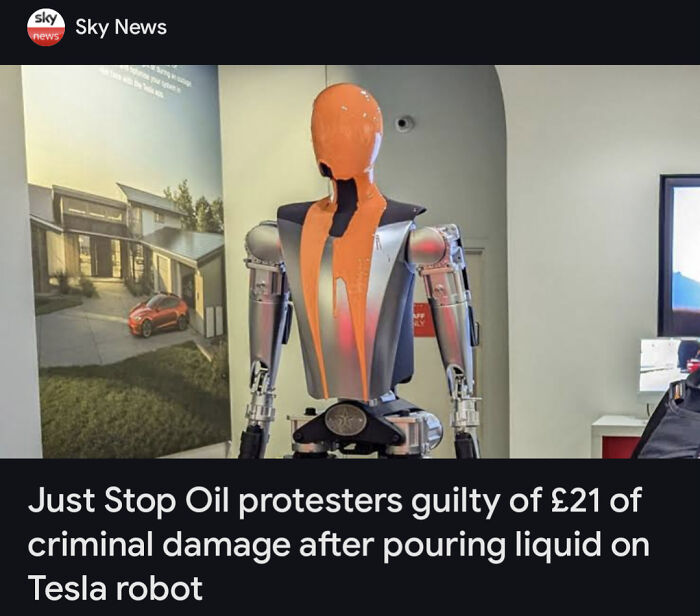 Tesla robot with liquid poured on it by protesters, featured in wild incidents making headlines recently.