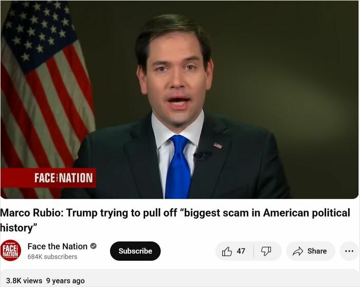 aged like wine posts: male politician in dark suit and blue tie speaking in a TV interview with US flag