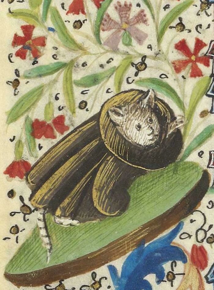 Medieval-style old painting of a mouse wearing a robe surrounded by colorful flowers and decorative elements.
