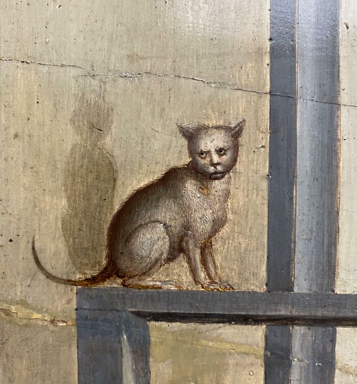 Old painting of a cat with a human-like face sitting on a ledge, showcasing hilariously bad old paintings art style.