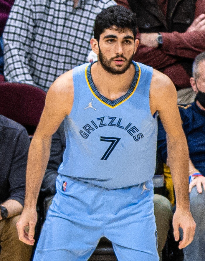 Santi Aldama in Memphis Grizzlies uniform on the basketball court during an NBA game.