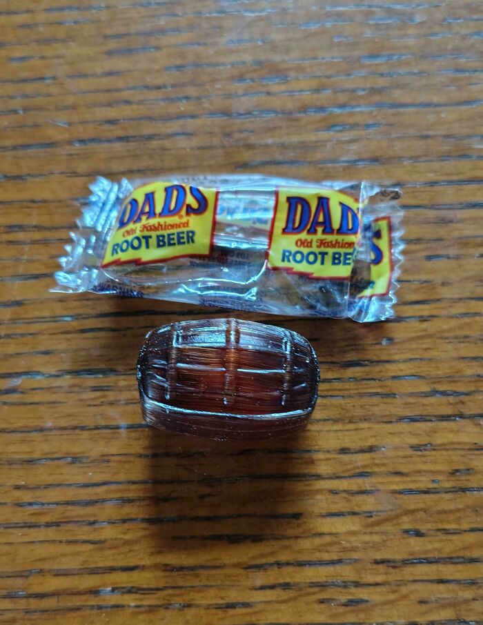 Dad's old fashioned root beer barrel candy on wooden surface, a nostalgic treat to make you feel old as heck.