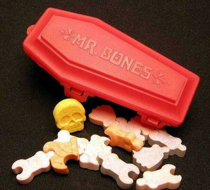 Red Mr. Bones case with vintage skull and bone-shaped candy pieces, evoking nostalgic feelings and making you feel old.