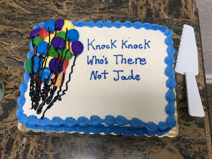 Funny cake with colorful balloon decorations and the text knock knock who’s there not Jade reflecting honest emotions