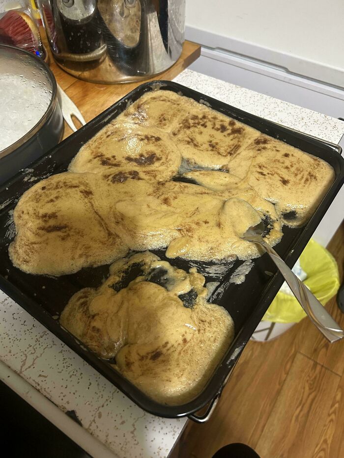Melted and misshapen dessert on a baking tray, showing a clear case of people ruining dessert unexpectedly.