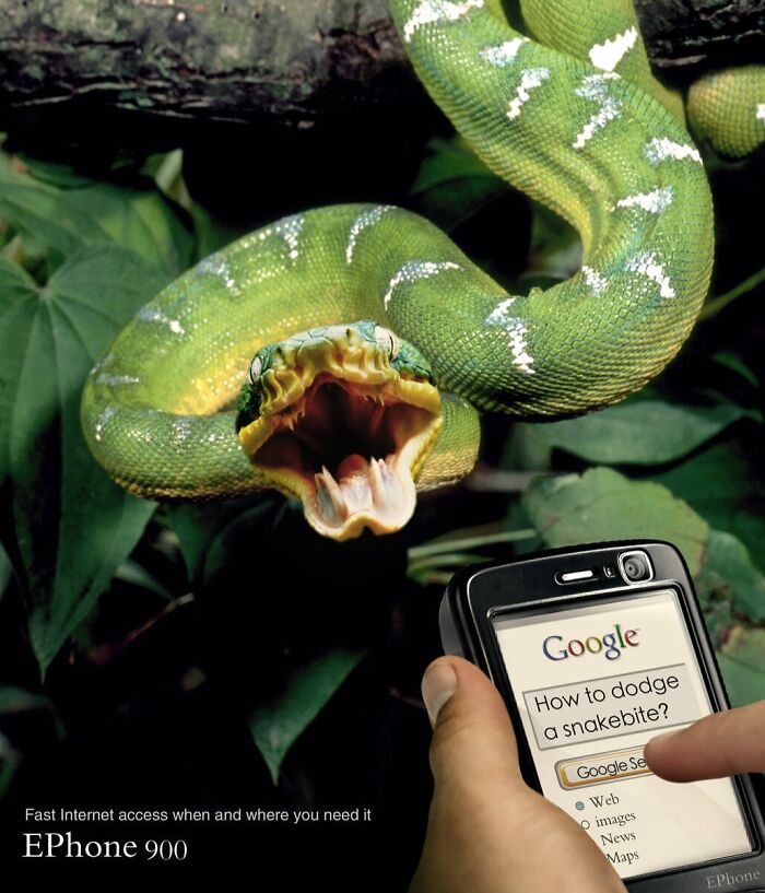 Green snake with mouth open near hand holding phone showing Google search, creative print advertisement using humor.
