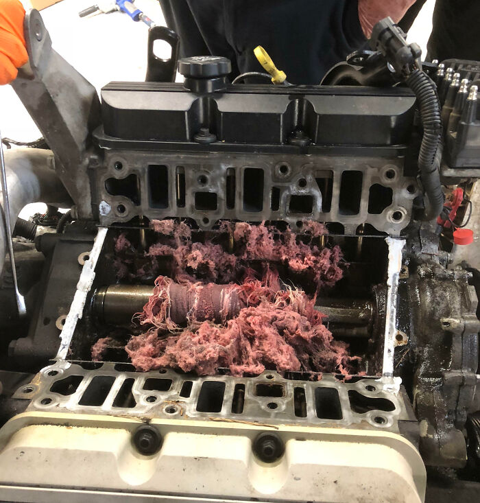 Engine damaged with insulation debris inside, showcasing one of the expensive unfortunate and stupid fails.