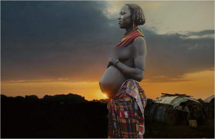 Dassanech Woman With New Life From The Series 'Tarly Morning Coffee With The Dassanech' By Kristyn Taylor