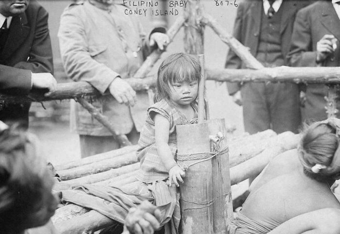 Filipino child at Coney Island in a historical US history photo showing past moments textbooks usually don’t capture.