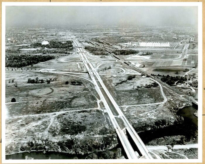 Aerial view of a historic US highway interchange under construction showing early infrastructure development in US history photos.