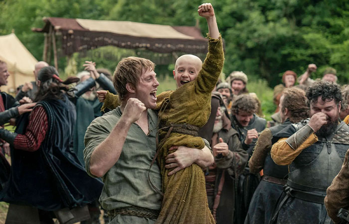 Joyful medieval crowd celebrating, featuring characters from A Knight of the Seven Kingdoms ahead of Season 1 release.