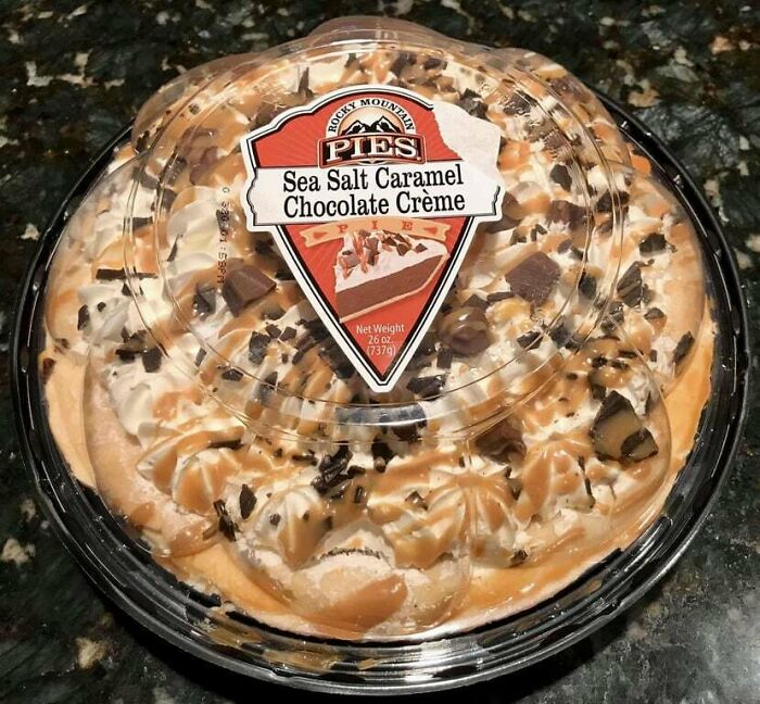 Sea salt caramel chocolate crème pie in plastic container, an example of men being men in everyday moments.