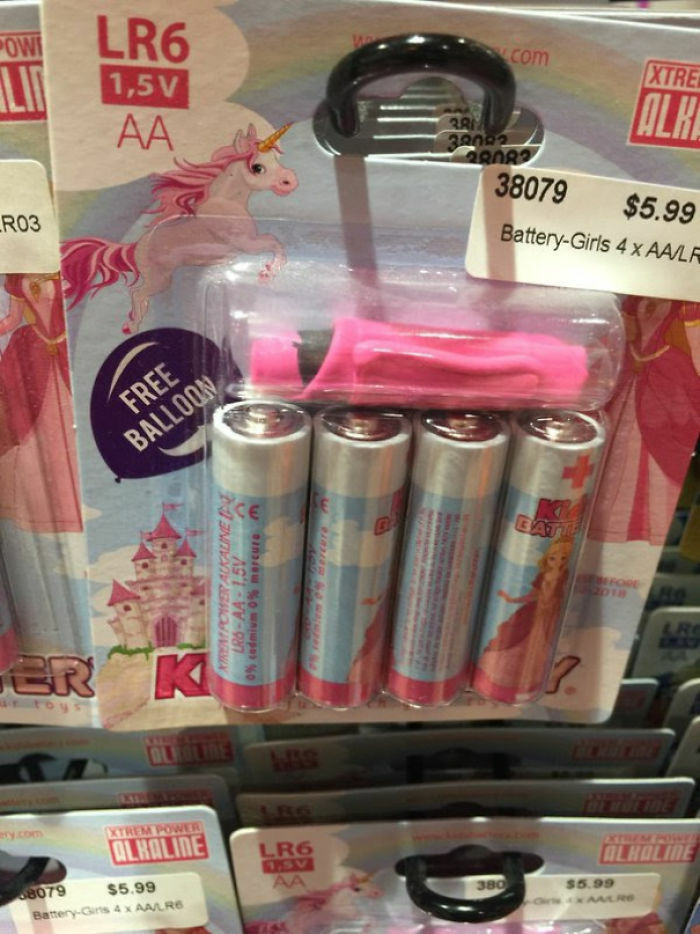Pack of AA batteries labeled Battery-Girls with pink balloon and princess-themed packaging highlighting gendered nonsense.