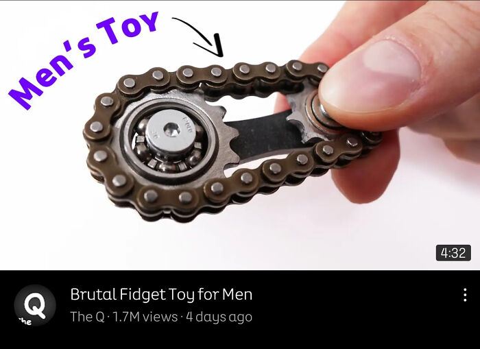 Close-up of a brutal fidget toy for men with a metal chain mechanism, illustrating examples of gendered nonsense.