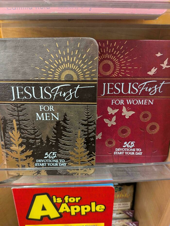 Two devotional books for men and women with gendered nonsense labels, titled Jesus First, on a store shelf.