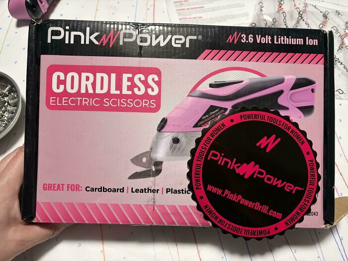 Pink cordless electric scissors box, highlighting gendered nonsense in marketing with tools labeled for women.