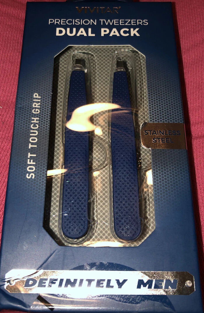Packaging of precision tweezers labeled with gendered nonsense phrase definitely men, showing examples of gendered nonsense.