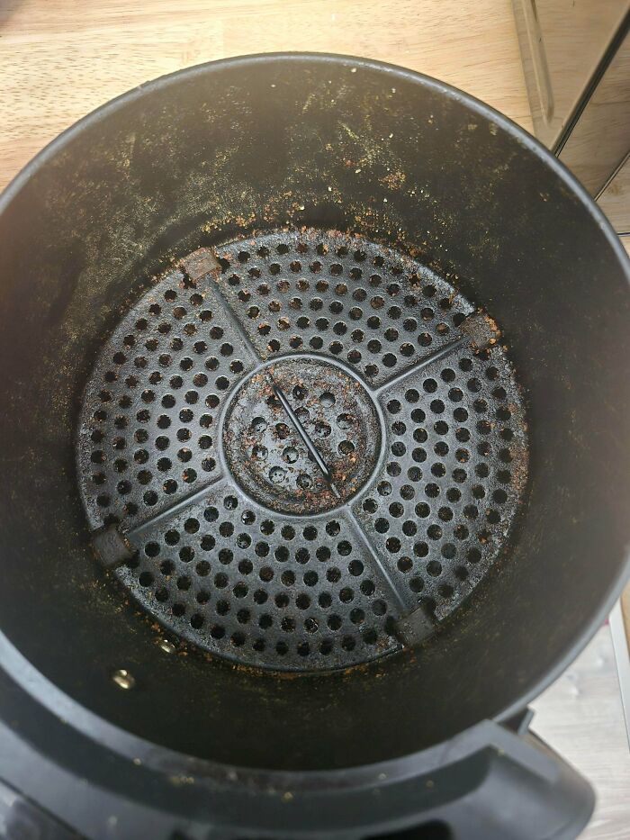 Dirty and neglected kitchen appliance showing grime and residue, highlighting jerks that made roommates consider living alone.