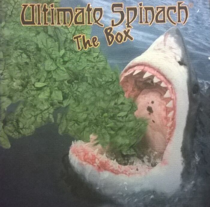 Album cover showing a shark with an open mouth spewing spinach leaves, a hilariously bad album cover design.