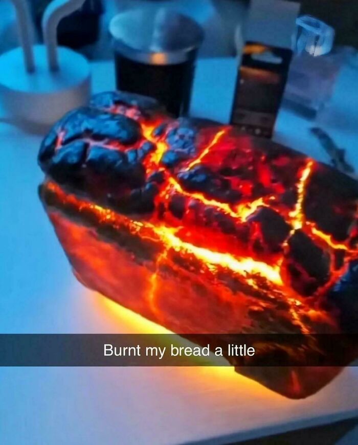 Burnt bread glowing like molten lava on a kitchen counter, showcasing one of the funniest screenshots people took.