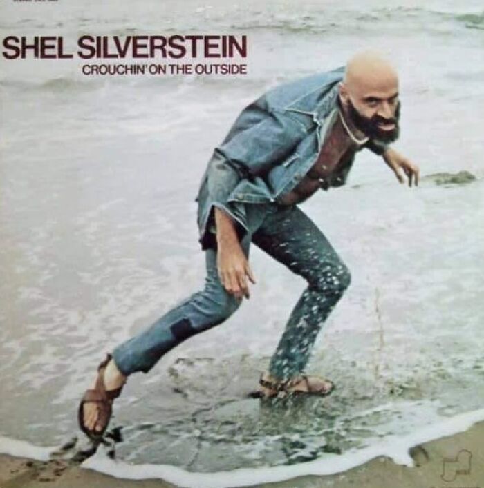 Shel Silverstein crouching on a wet beach in denim outfit and sandals on a hilariously bad album cover.