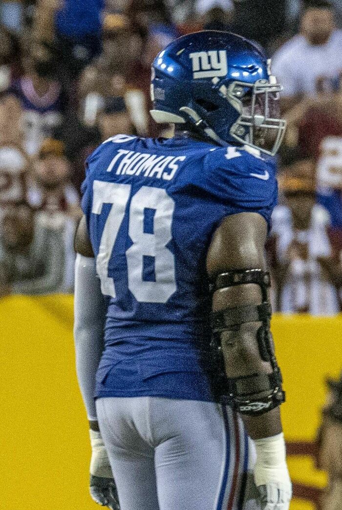 Football Player Andrew Thomas, 27