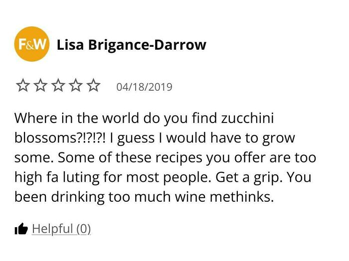 Screenshot of an unhinged review complaining about finding zucchini blossoms in a failed recipe try.
