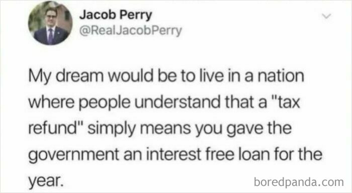 Group of professionals in a meeting with a laptop showing a funny screenshot about tax refund as a free loan to the government.