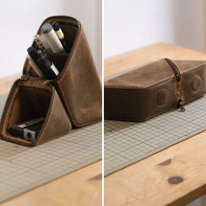 Leather pencil case with multiple compartments, neatly organized to bring order into your workspace.
