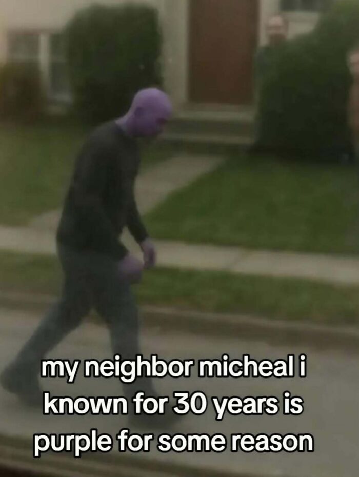 Blurry photo of a person with purple skin walking outside, captioned about a neighbor being purple in funny screenshots.