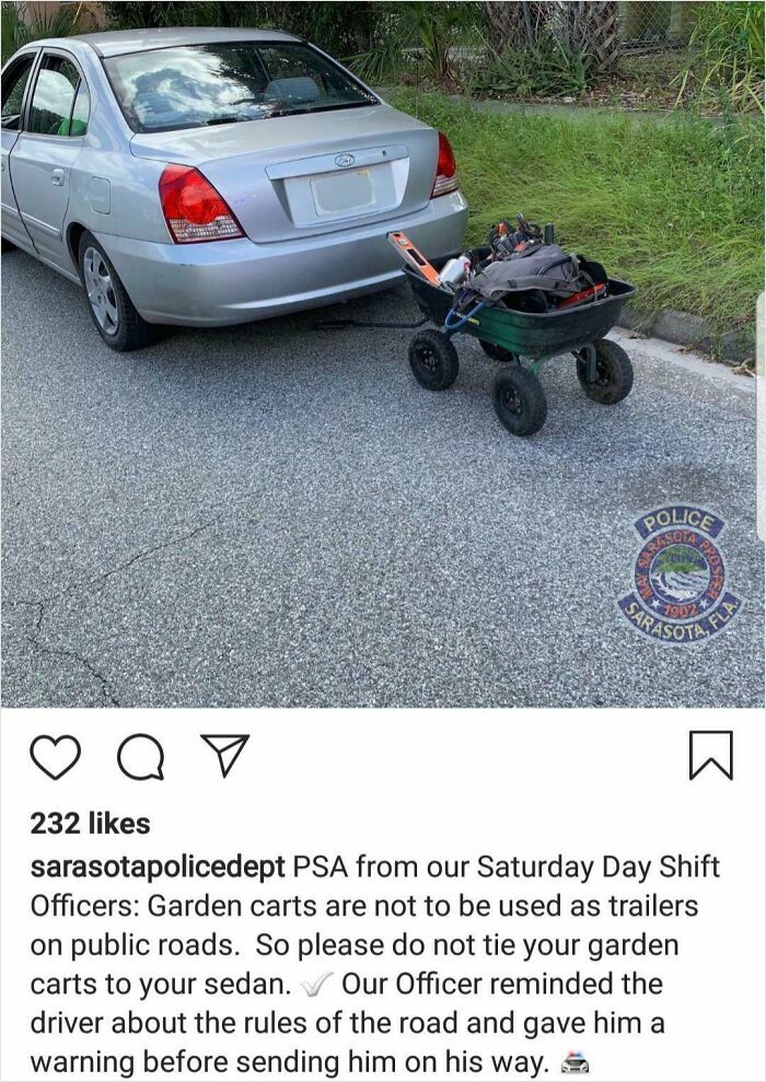 Silver sedan towing small garden cart on street with police PSA about garden carts from police social media accounts.