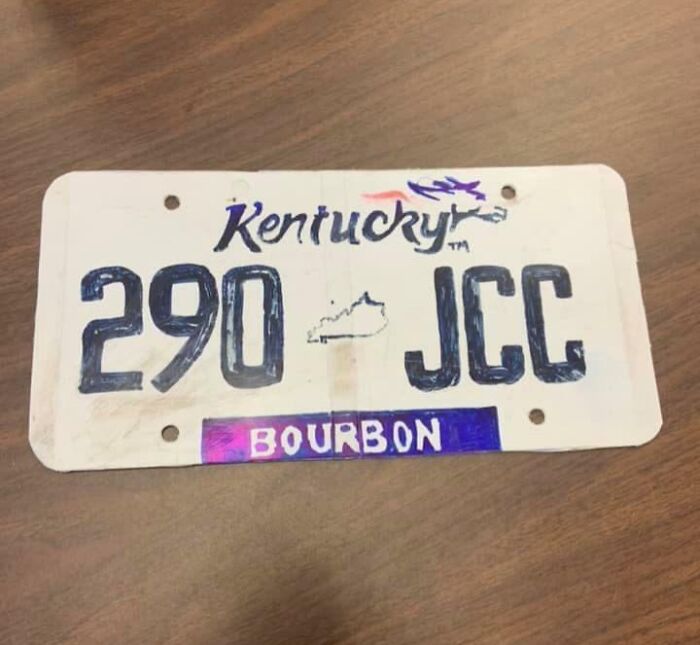 Hand-drawn Kentucky license plate with the word bourbon, illustrating dumb driver mistakes and bad driving behavior.