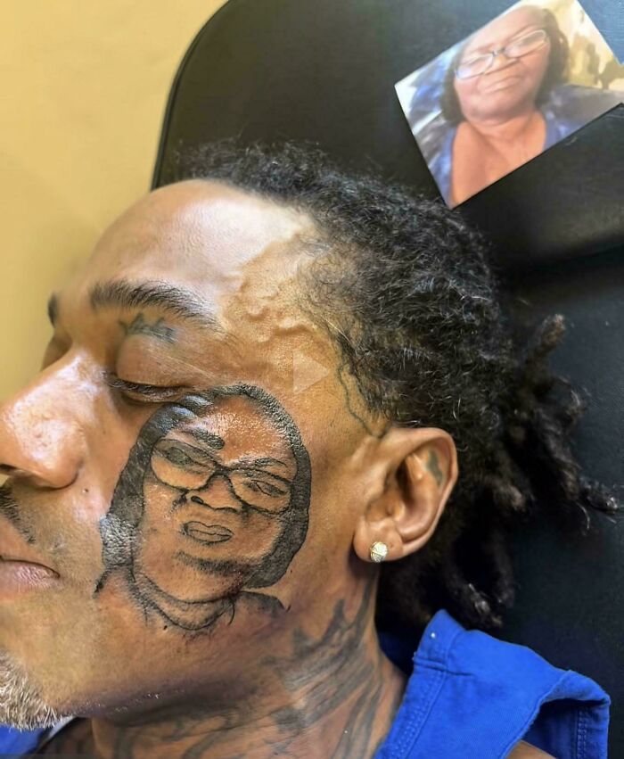 Man with a poorly done face tattoo resembling a photo of a woman, showcasing badly executed tattoos and bad tattoo decisions.