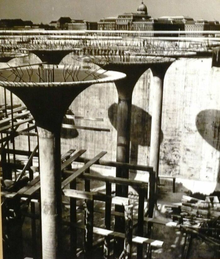 Construction site with multiple large, mushroom-shaped concrete pillars, an example of extremely large things that can be scary.