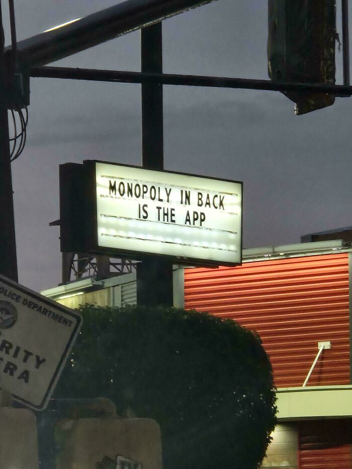 Outdoor lightbox sign with a confusing message, example of common sense fails in you had one job moments.