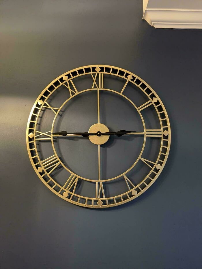 Wall clock with Roman numerals showing incorrect time, a common You Had One Job fail highlighting lack of common sense.