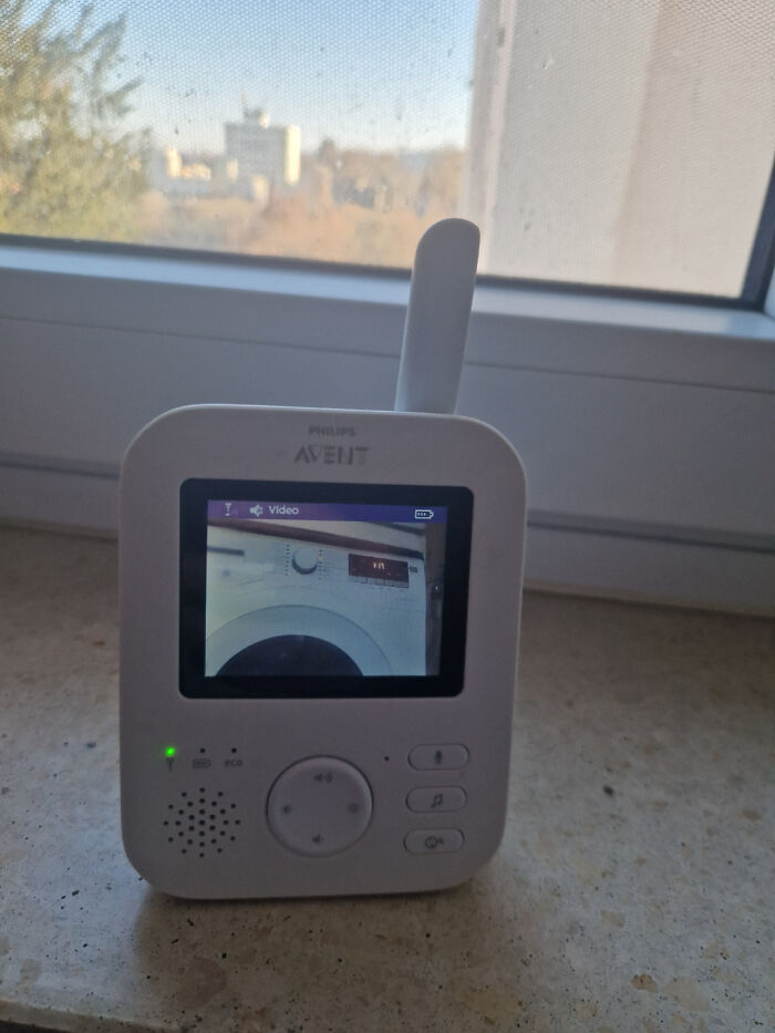 Baby monitor showing a washing machine screen as part of redneck engineering, blending household devices creatively.